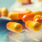 Orange pills representing oxycontin detox california