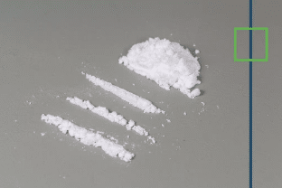 Crack cocaine typically looks like small, solid, and off-white or tan-colored rocks or crystals. The appearance can vary somewhat depending on the manufacturing process and any additional substances that may have been added