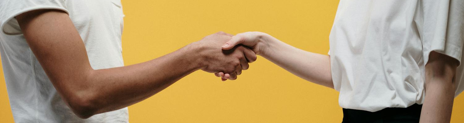 Two people shaking hands