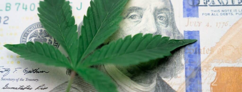 Marijuana leaf on a dollar bill