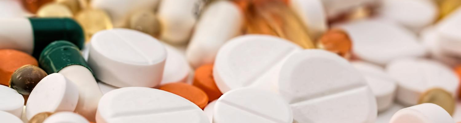 Many different pills symbolizing a variety of drug detox California treatments