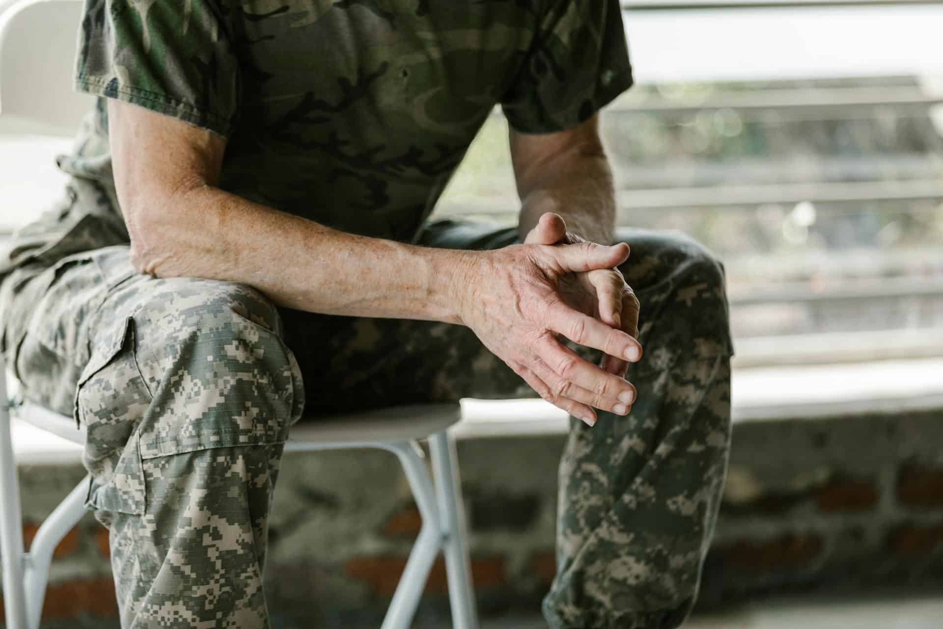 A veteran wearing their military uniform
